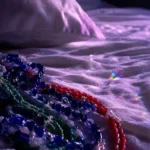 Guias de contas da umbanda sobre a cama, representando o recado do guia em sonho